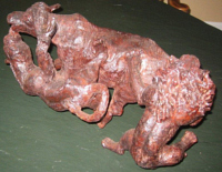 Ironwood Carving: Lion Attack